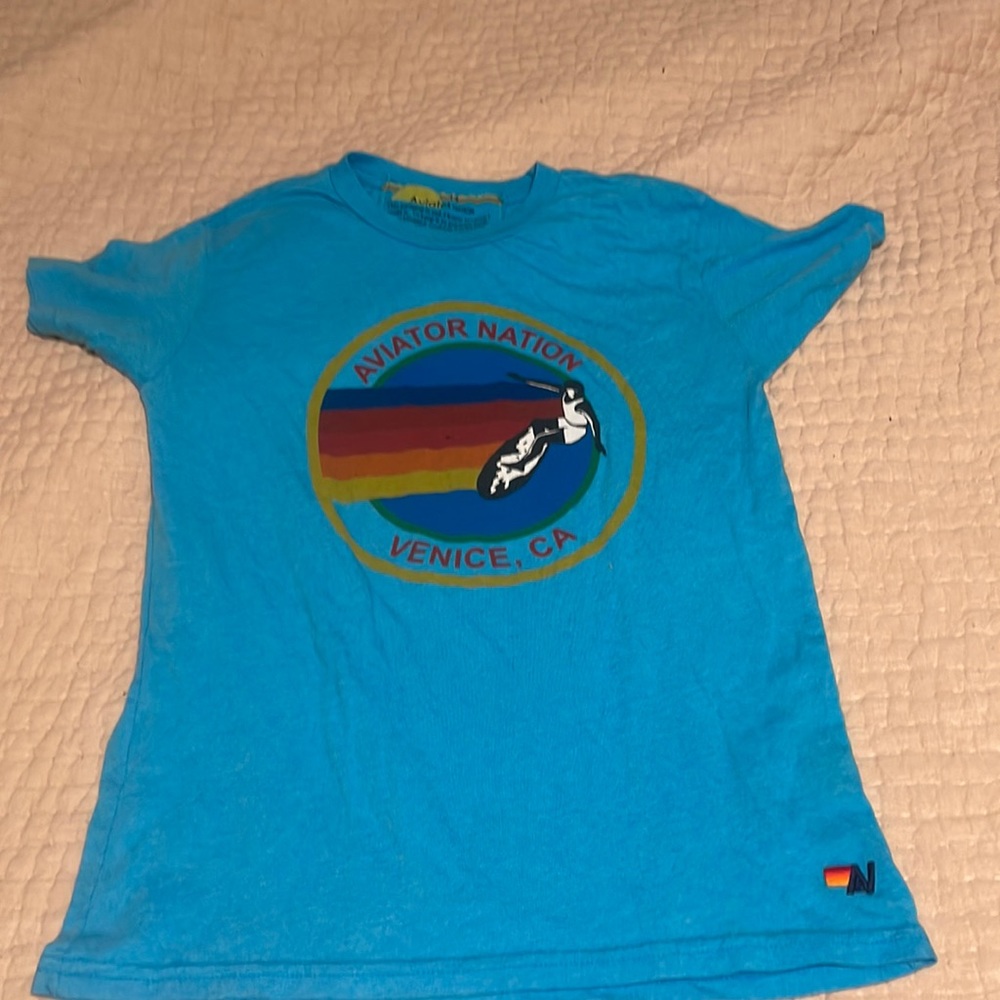 bright blue oversized aviator nation logo t-shirt